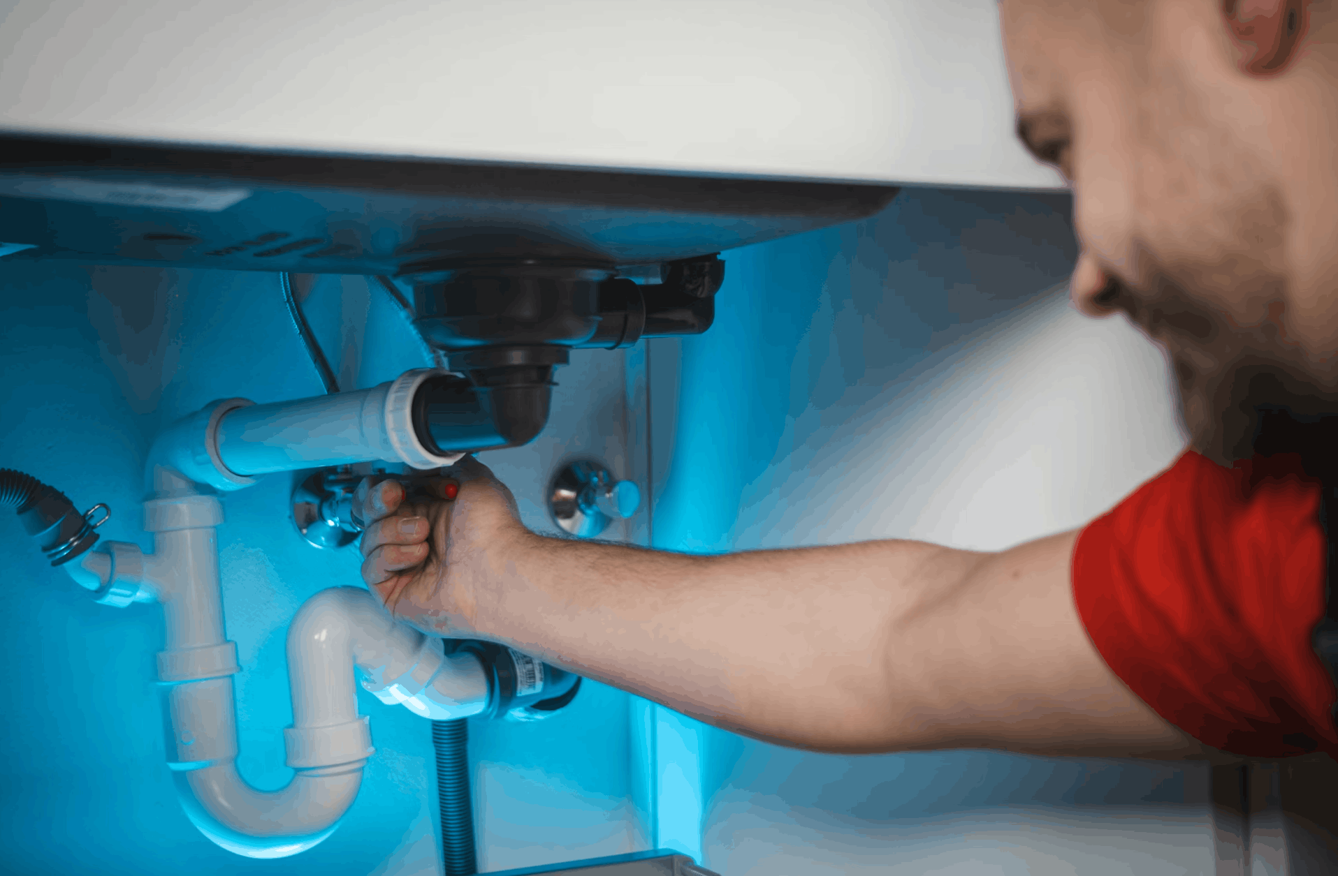 Plumbing website design on laptop showing emergency plumbing services